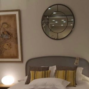 Cabecero de hierro curvo